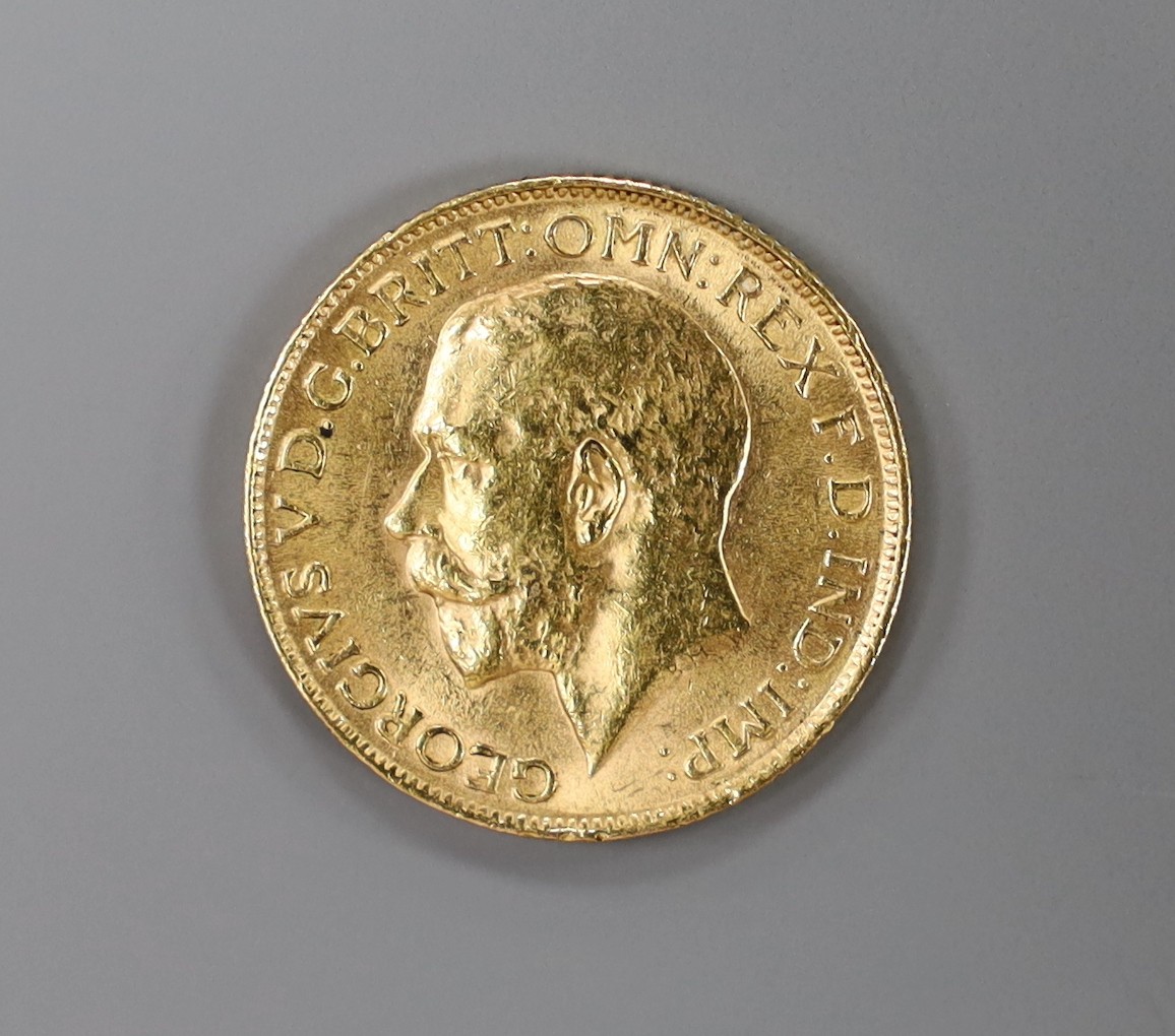 A George V 1913 gold sovereign.